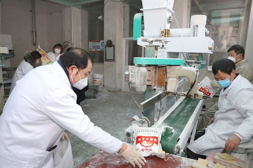 江蘇南通百年面粉廠復(fù)工 全力抓生產(chǎn)保供應(yīng)